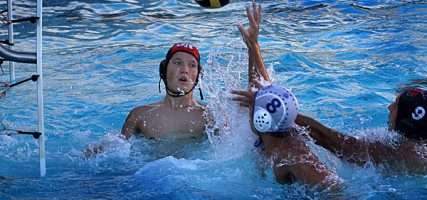 Burbank's Zachary Card, #8, scores against Indians goalie Dillon Wiegand (Photo by Ross A. Benson)
