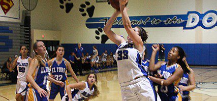 Courtney Seidler scores two of her 16 points (Photo by Dick Dornan)