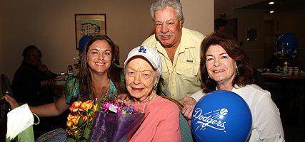 Burbank resident Lucille Bible in pink celebrates her 100 year old birthday, with family members Chuck,Patty and Dena. (Photo by Ross A. Benson)
