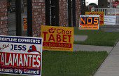 Campaign Signs at a Magnolia Business. (Photo by Ross A. Benson)
