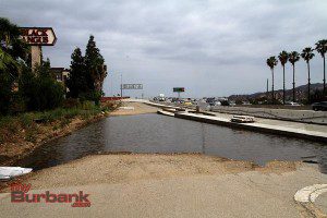 I can hear Andy & Opie whistling their favorite Andy Griffith song.. This is the boat ramp to Burbank's new lake. Nice Palm trees, and a Black Angus just a rock throw from the dock, hope it doesn't dry up before you get to see it. Look to the right as you go East of the Olive Overpass.. (Photo by Ross A. Benson)
