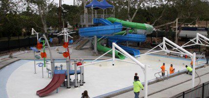 Water Slide in place, plaster drying, and the pool is in the progress of getting filled Wednesday afternoon. (Photo by Ross A. Benson)