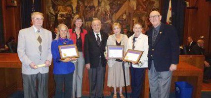 Older American Volunteer Service Awardees honored at City Council Meeting (Left to right): Senior Board member Doug Halter; Awardee Sue Stimpson; Mayor Emily Gabel-Luddy; Senior Board member Peter McGrath; Awardees Peg Setti and Sandy Struble; and Senior Board member Bill Anderson