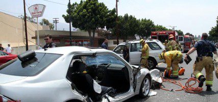 Firefighters used the 'Jaws of Life' to open up the side of this car following an accident at Rosita & Glenoaks Blvd. (Photo by Ross A. Benson)