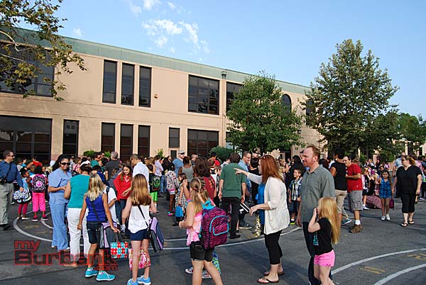 Parents accompany their children on the first day as students line up to meet their teachers at Roosevelt (Photo by Lisa Paredes)