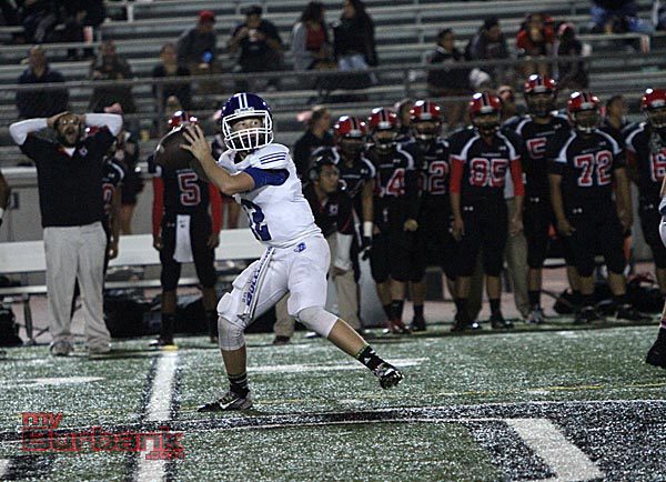 Burbank's Guy Gibbs came off the bench to throw for three touchdowns (Photo by Ross A. Benson)