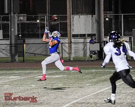 Dorian Housholder hauls in a touchdown (Photo by Craig Sherwood)