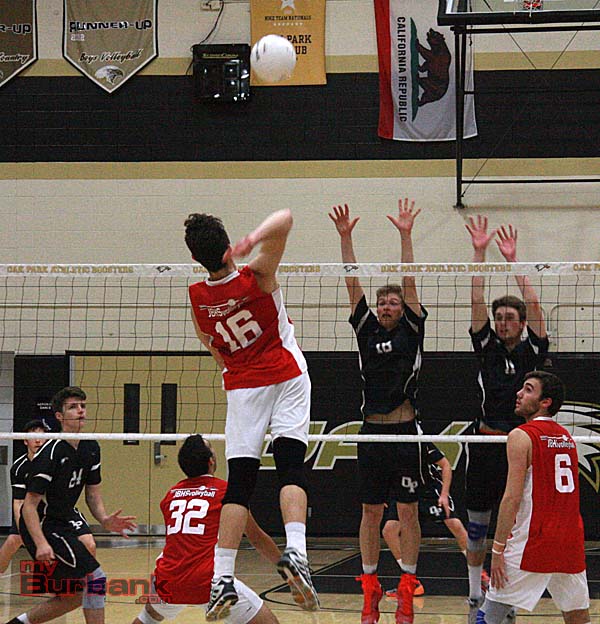Cameron Capili records a kill against Oak Park (Photo by Dick Dornan)
