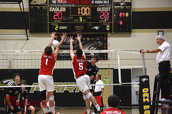 Bailey Carter (left) and Andrew Dalmada go for a block (Photo by Dick Dornan)