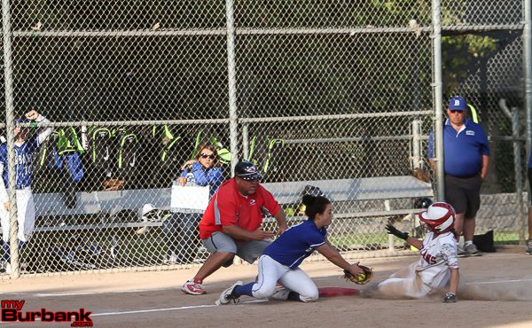 The Burroughs Indians slid safely by the Lady Bulldogs to capture a share of the league title (Photo by Ross A. Benson)