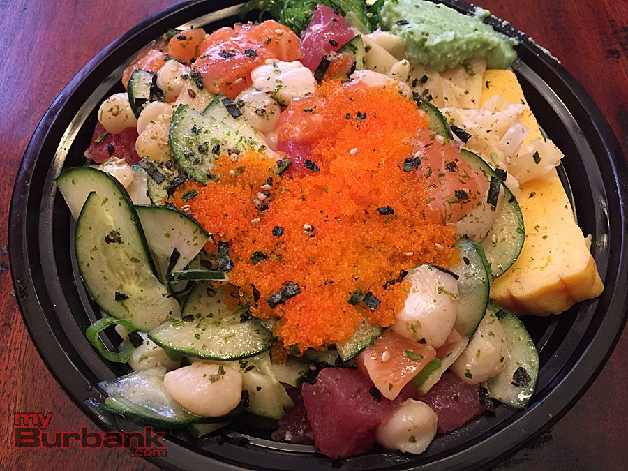 All About Poke Burbank's medium bowl piled high with raw bay scallops, tuna, salmon, tamago (sweet egg), flying fish roe and more. (Photo By Lisa Paredes)