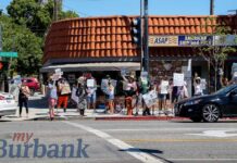 Photo Gallery: Gun World Opening Brings Protesters and Customers