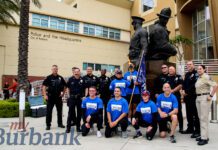 Burbank Police run the Special Olympics Torch through the City