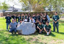 Muir Middle School Celebrates Twelfth Annual Japan Day Students from Japan's Rebun Island and teacher Ted DeVirgilis pose with the Muir Peace Monument at John Muir Middle School's twelfth annual Japan Day. (Photo Courtesy Kentaro Terra)