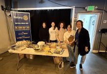 Burbank Noon Rotary and VFW Pancake Breakfast a Resounding Success Five volunteers stand before an array of food at the Burbank VFW