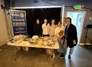 Burbank Noon Rotary and VFW Pancake Breakfast a Resounding Success Five volunteers stand before an array of food at the Burbank VFW