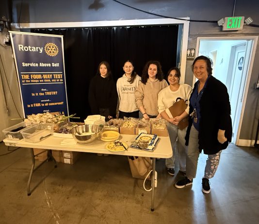 Burbank Noon Rotary and VFW Pancake Breakfast a Resounding Success Five volunteers stand before an array of food at the Burbank VFW